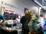 Much to see at the Broadway Market - Janice picks her Easter lily.
